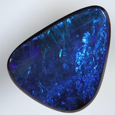 SOLID BOULDER OPAL Bright turquoise blue sparkles over deep ocean blue
